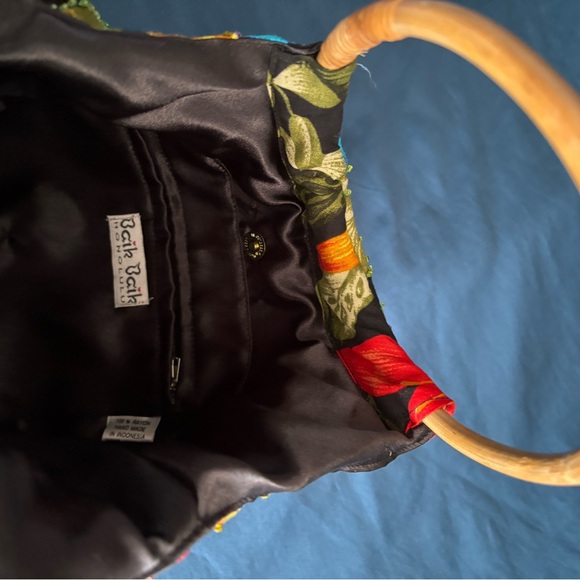 Brightly colored floral bag with beading outline flowers.  Bamboo ring handles. - Picture 3 of 5